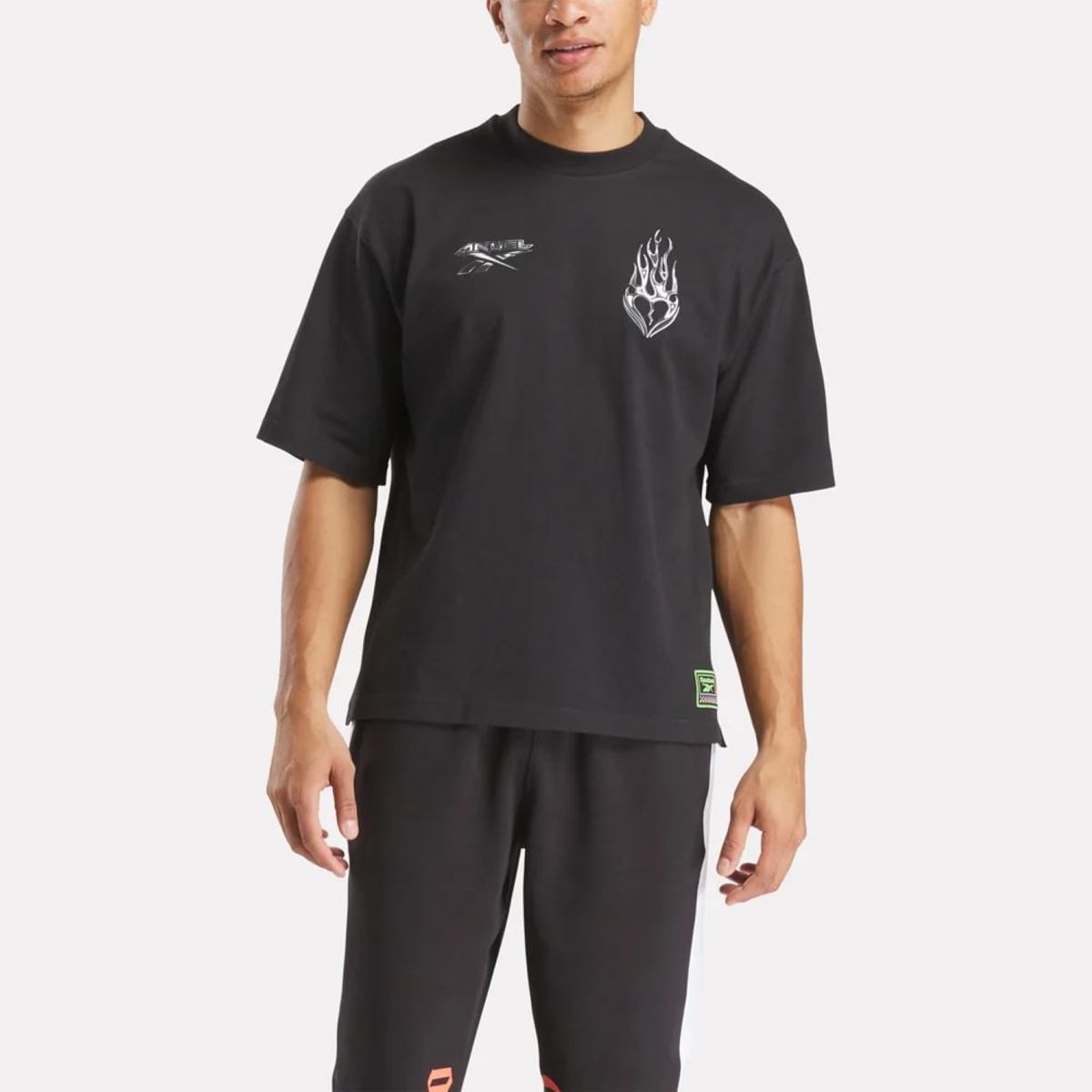 REEBOK - Polo Reebok Anuel Tee Negro Hombre