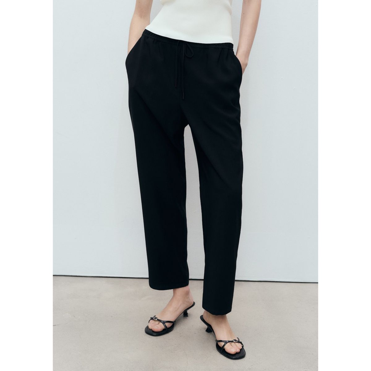 MANGO - Pantalón Fluido Tiro Medio Mujer Mango.