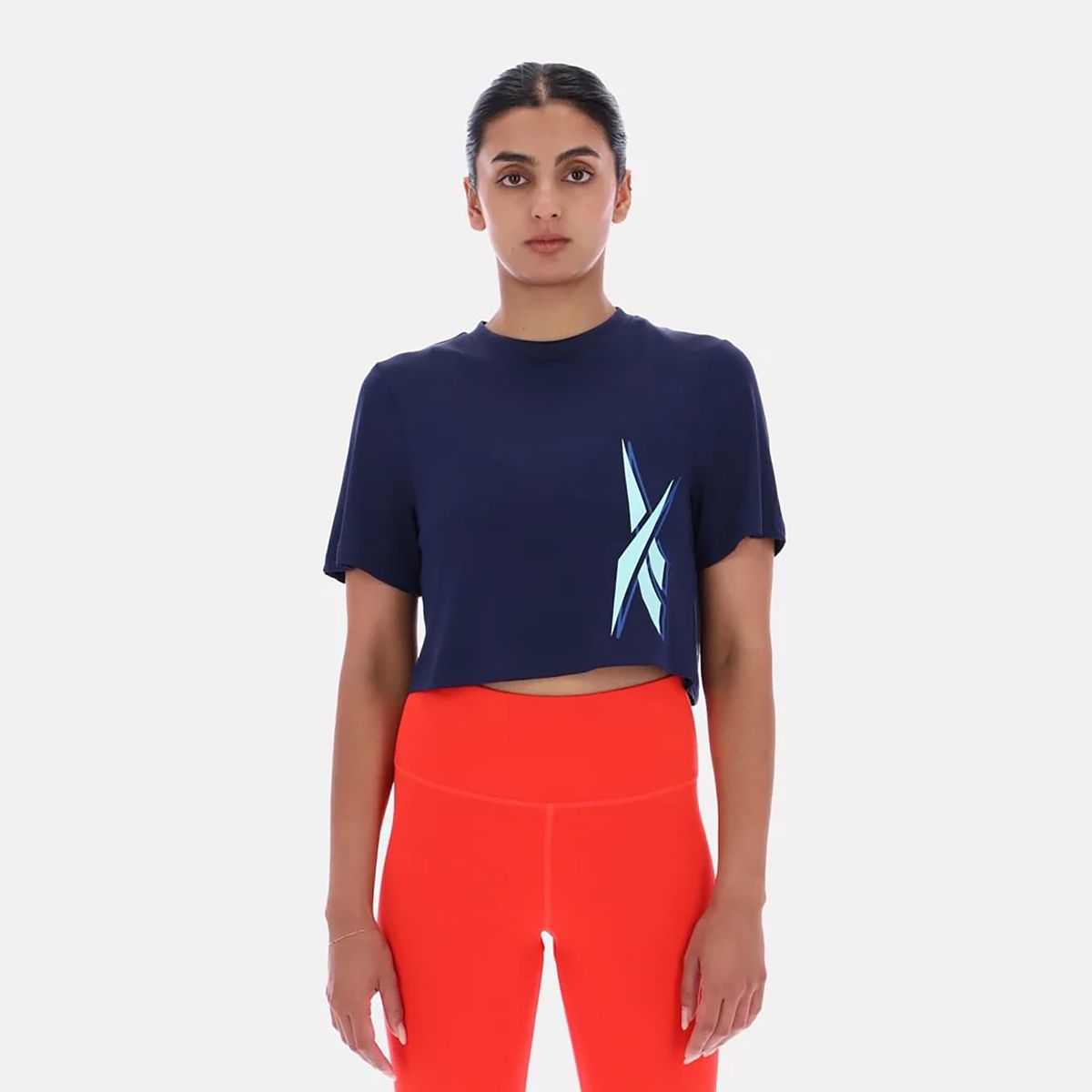 REEBOK - Polos Training Sloan Core Graphic Crop Top Reebok Mujer