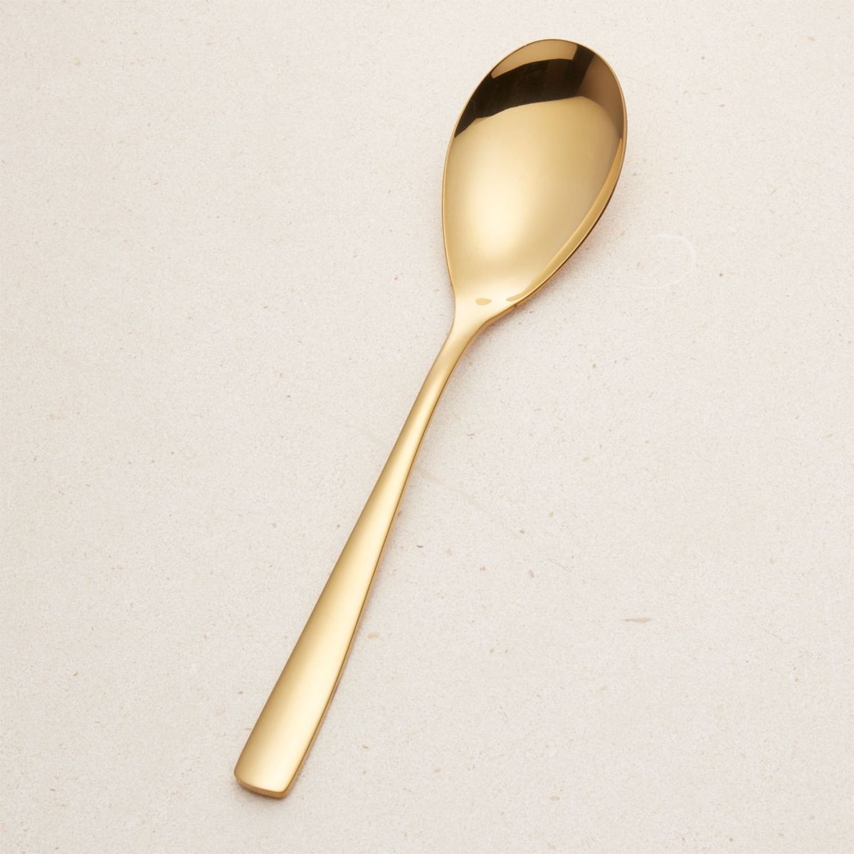 CRATE & BARREL - Cuchara para Servir Dorada