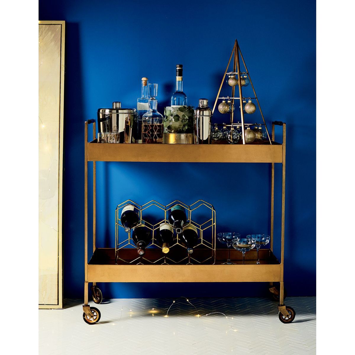 CRATE & BARREL - Rack para 11 Botellas de Vino Dorado
