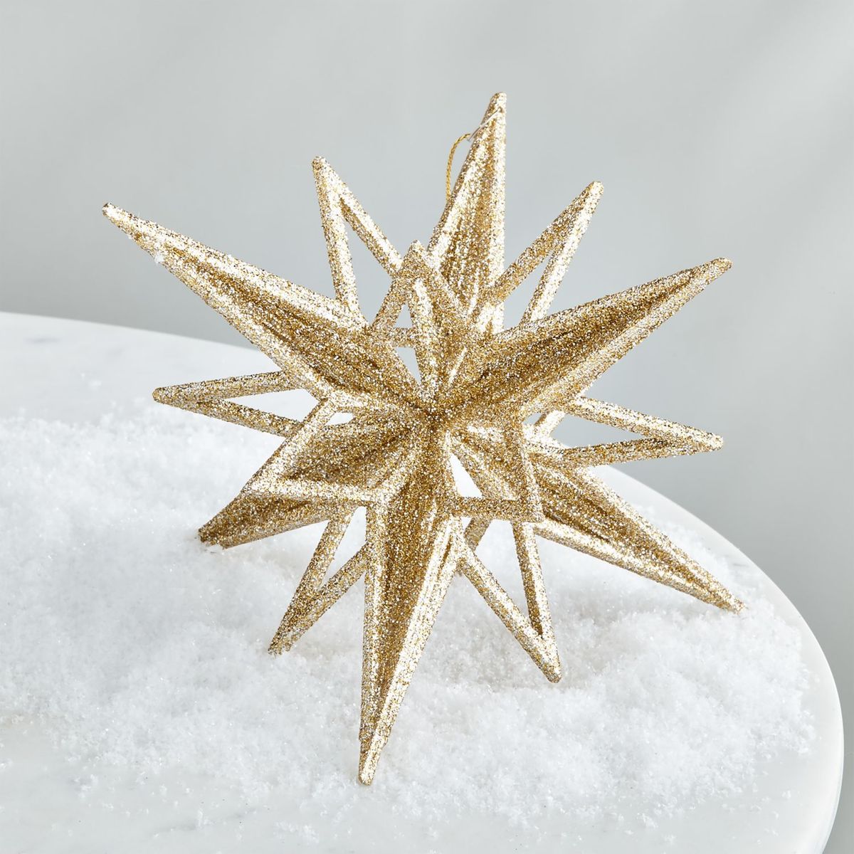 CRATE & BARREL - Adorno de Estrella Radiante de Escarcha Dorada