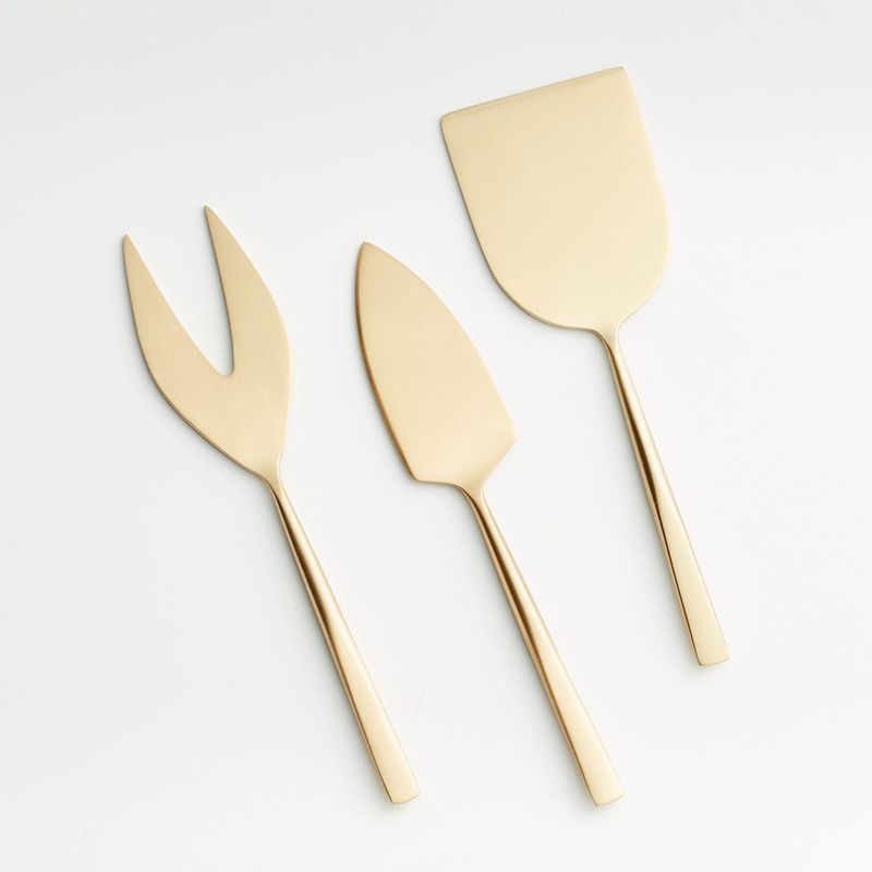 CRATE & BARREL - Juego de 3 cuchillos de queso dorado