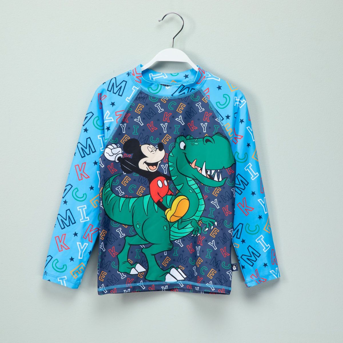 STD CHARACTERS - Polo Manga Larga UV Niño