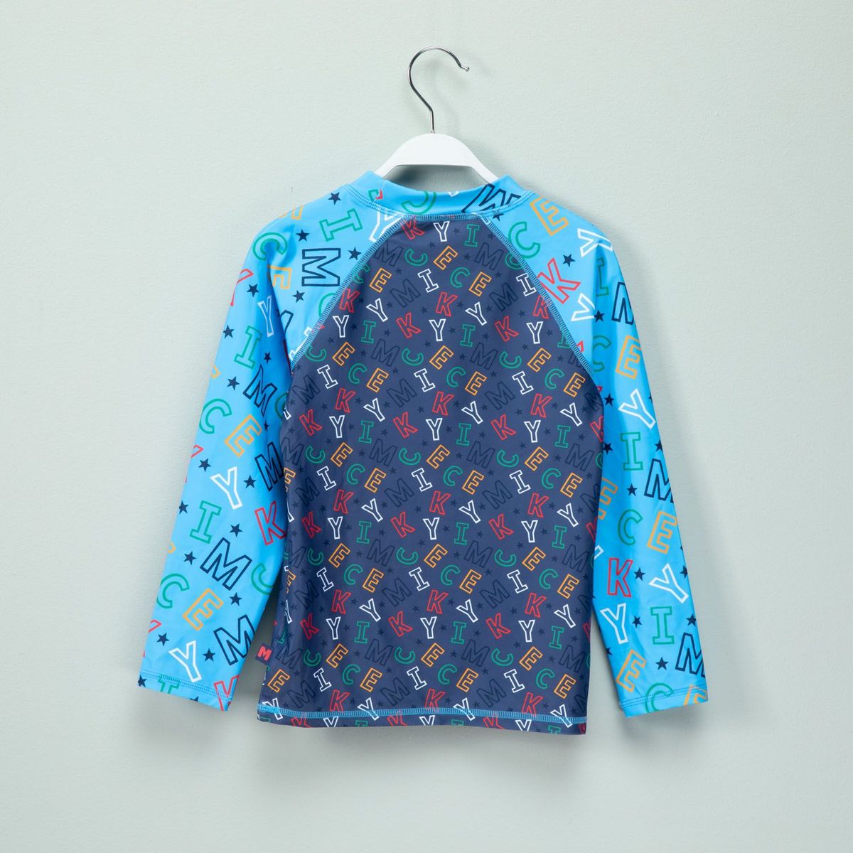 STD CHARACTERS - Polo Manga Larga UV Niño