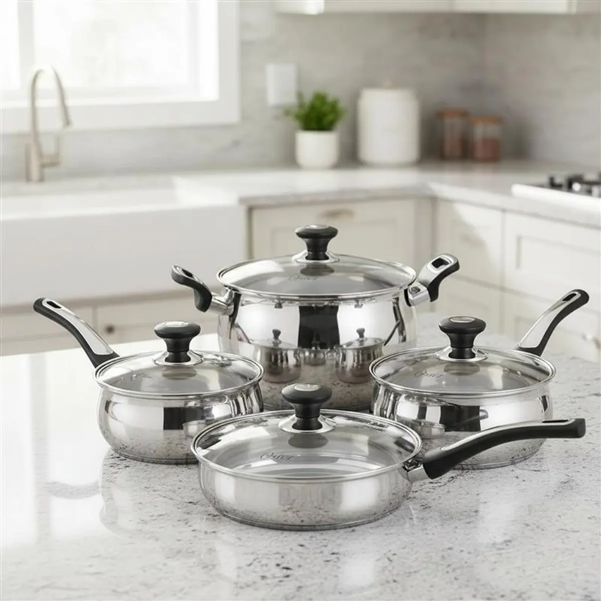 OSTER - Juego de Ollas 8 Piezas Acero Inoxidable