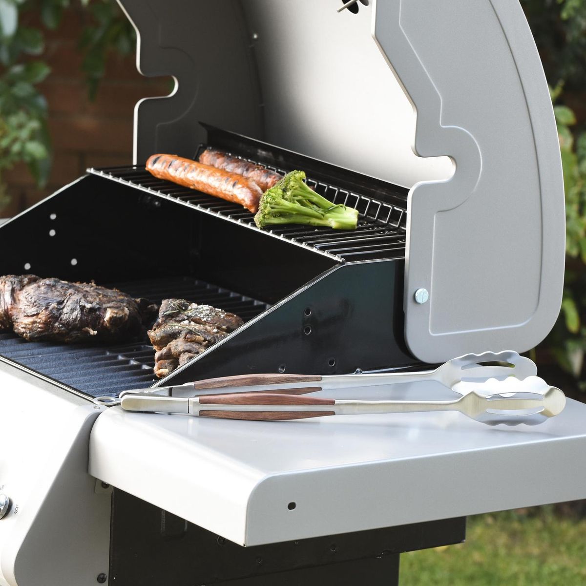 MAN LAW - Tenaza retráctil para asado acero inoxidable