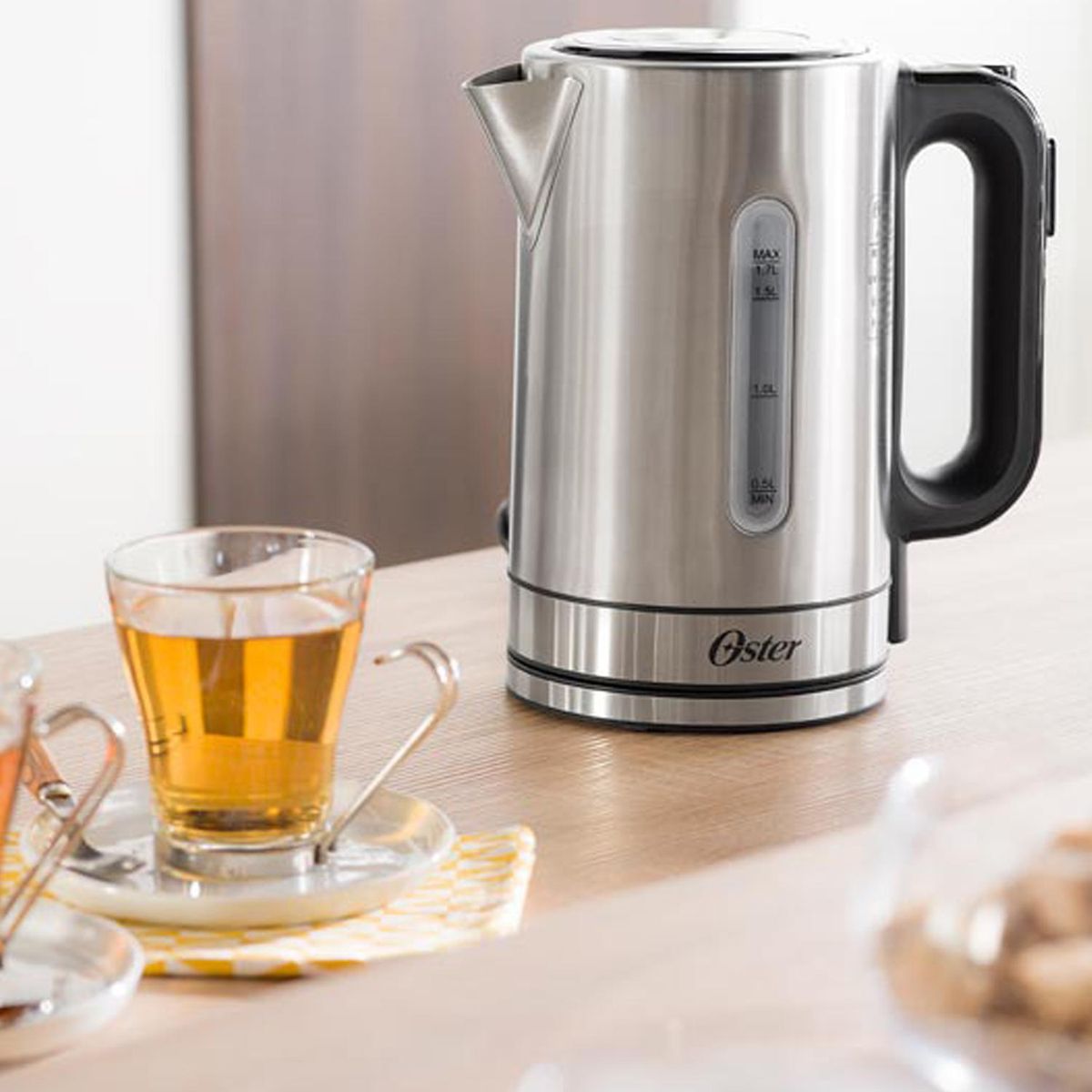 OSTER - Hervidor eléctrico con control de temperatura 1,7 litros inox