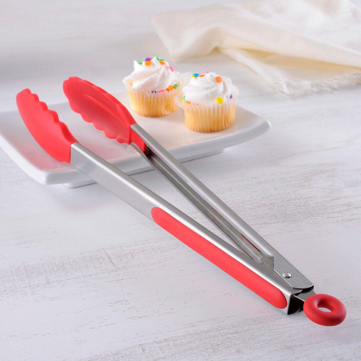 CASA BONITA - Tenaza acero inoxidable mango de silicona rojo