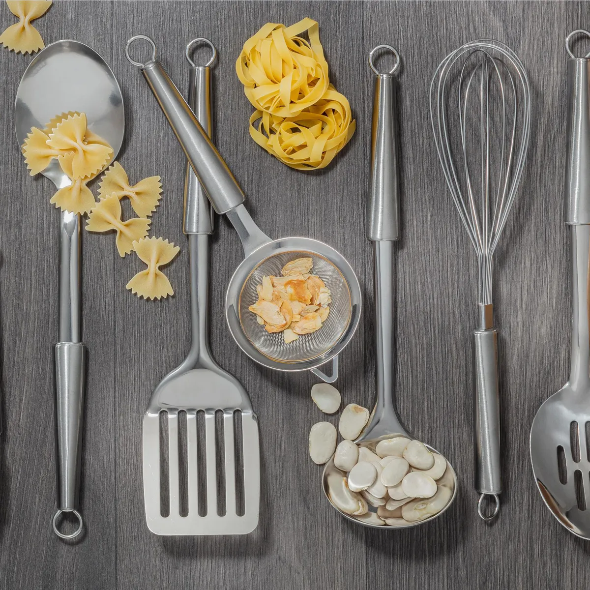 JUST HOME COLLECTION - Espátula Ranurada Inoxidable Just Home Collection 32.5 cm