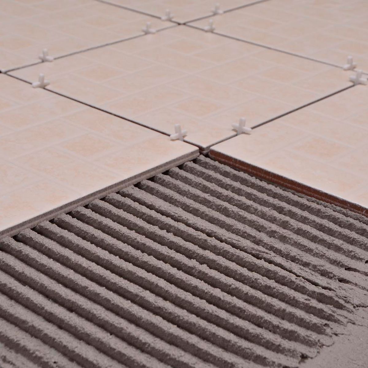 Cemix - Adhesivo porcelánico gris 20 kg