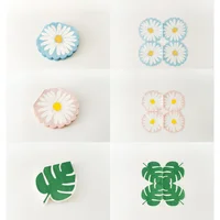 Servilleta de papel hojas y flores