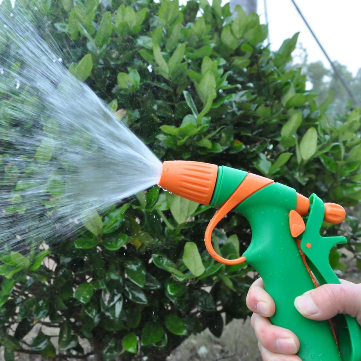 ERGO - Pistola Ajustable para Riego PVC Verde y Naranja