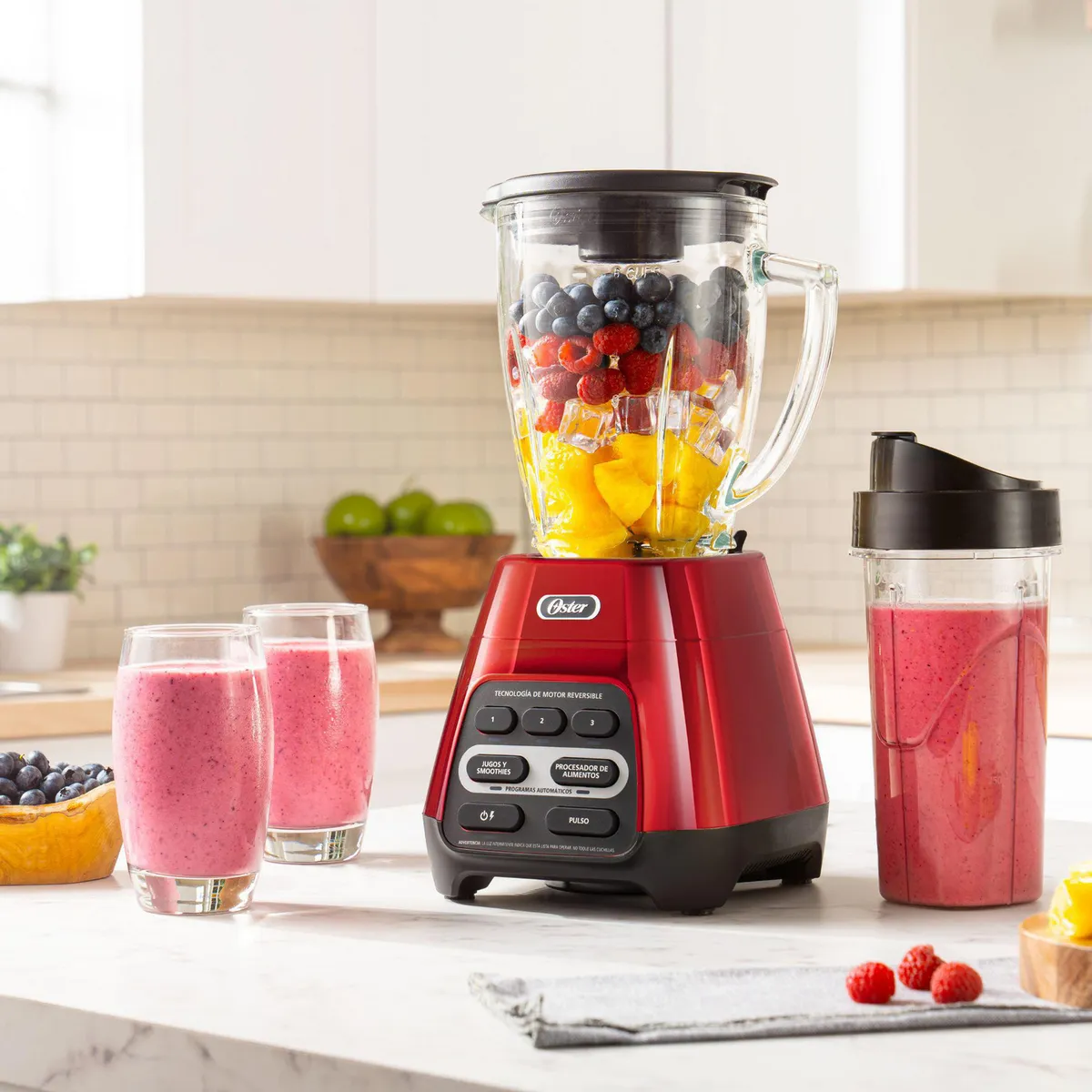 OSTER - Licuadora 1.5 Litros Roja con Vaso Blend N Go BLSTPYG1310RBG