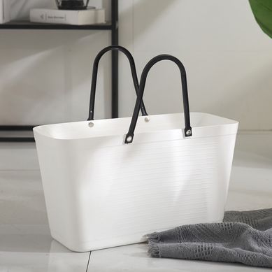 Cesto de ropa con mango blanco y negro